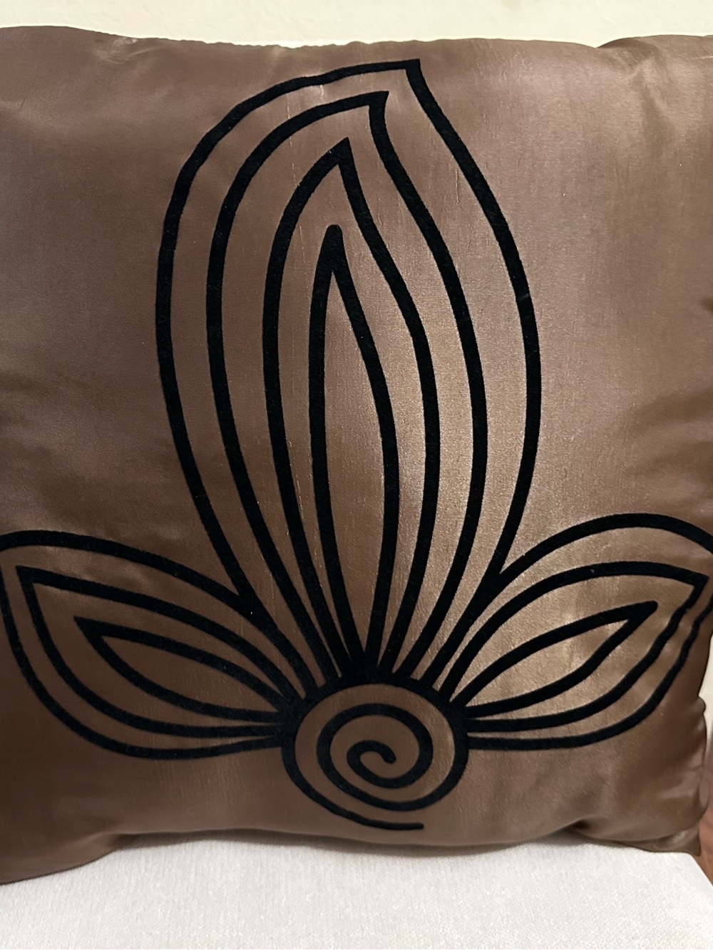 Decorative Throw Pillow with Black Floral Motif on Taupe